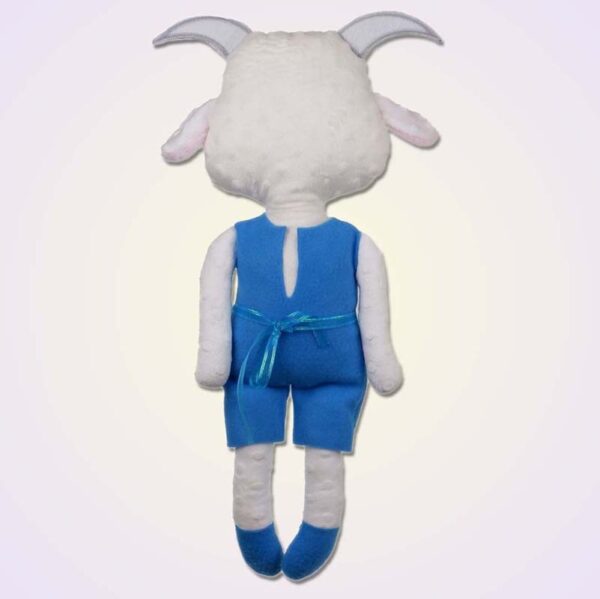 Goat boy doll ith machine embroidery design back